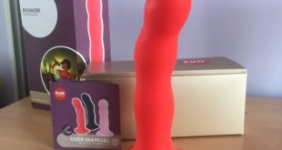 Fun Factory Bouncer Red Silicone dildo displayed with original packaging.