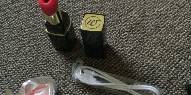 Womanizer 2GO lipstick clitoral stimulator with charging cable
