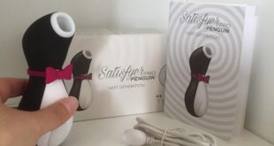 Black and white silicone penguin clitoral stimulator from Satisfyer