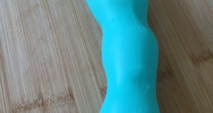 Turquoise silicone Dodil reshapeable dildo slightly curved and with slight bulbous texture.