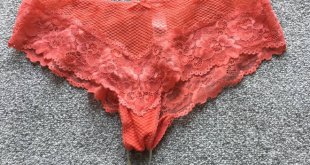 Peach lacy pants with a heart-shaped padlock