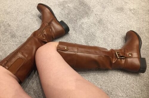 Luv Bunny wearing tan buckle boots